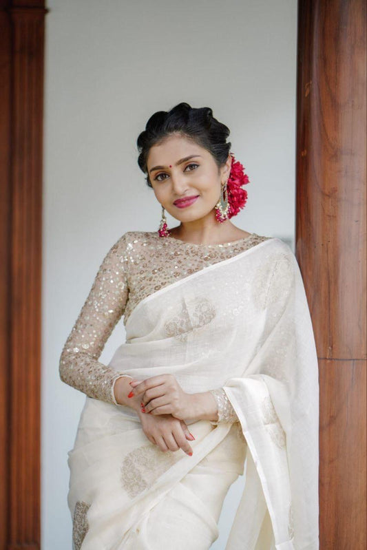 White & Golden | Kerala linen woven zari jacquard Saree